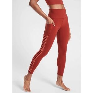 Athleta SALUTATION STASH POCKET II TWIST 7/8 TIGHT Russet Brown Sz L